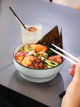 Poke bowl and chopsticks