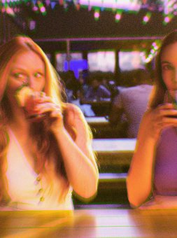 Two women drinking at YOTEL New York Times Square